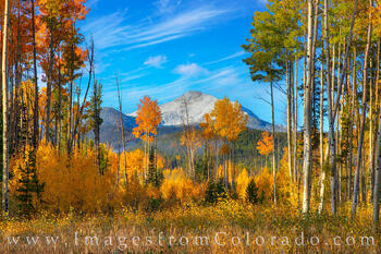 Fall colors surround a window view of the iconic Byers Peak near Fraser and Winter Park, Colorado on a cold October morning.