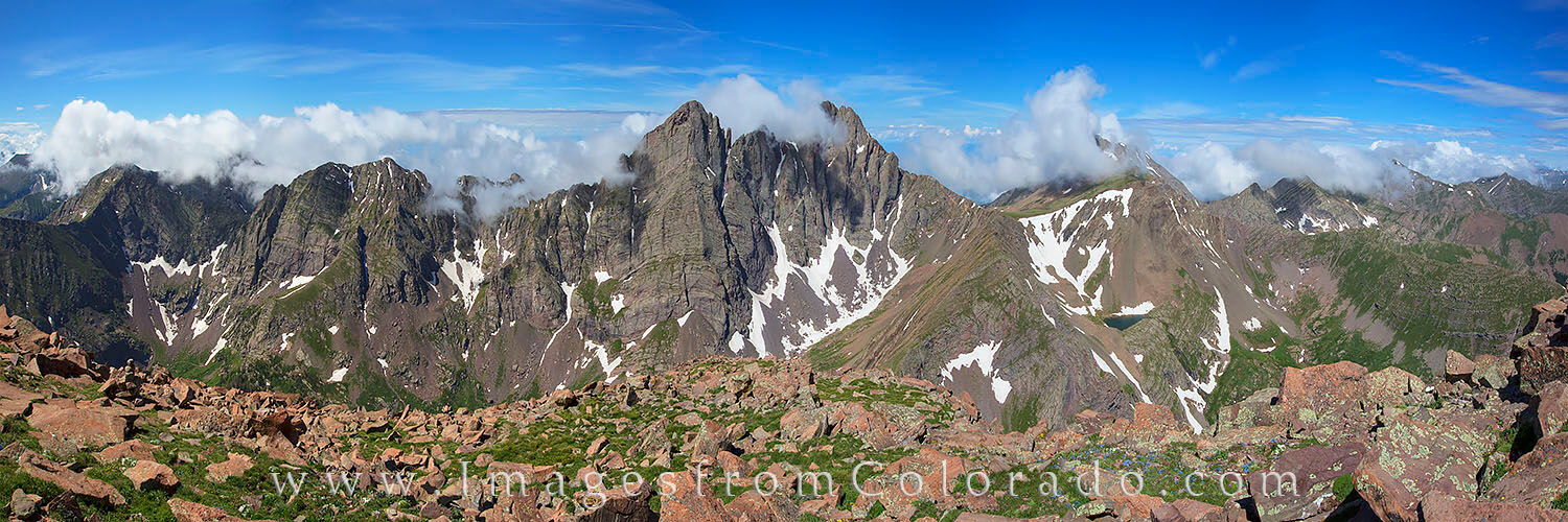 14ers Panorama - the Crestones 1 The Majestic Crestone Needle and Crestone Peak rise into the late morning sky while shrouded in clouds. This panorama shows the...