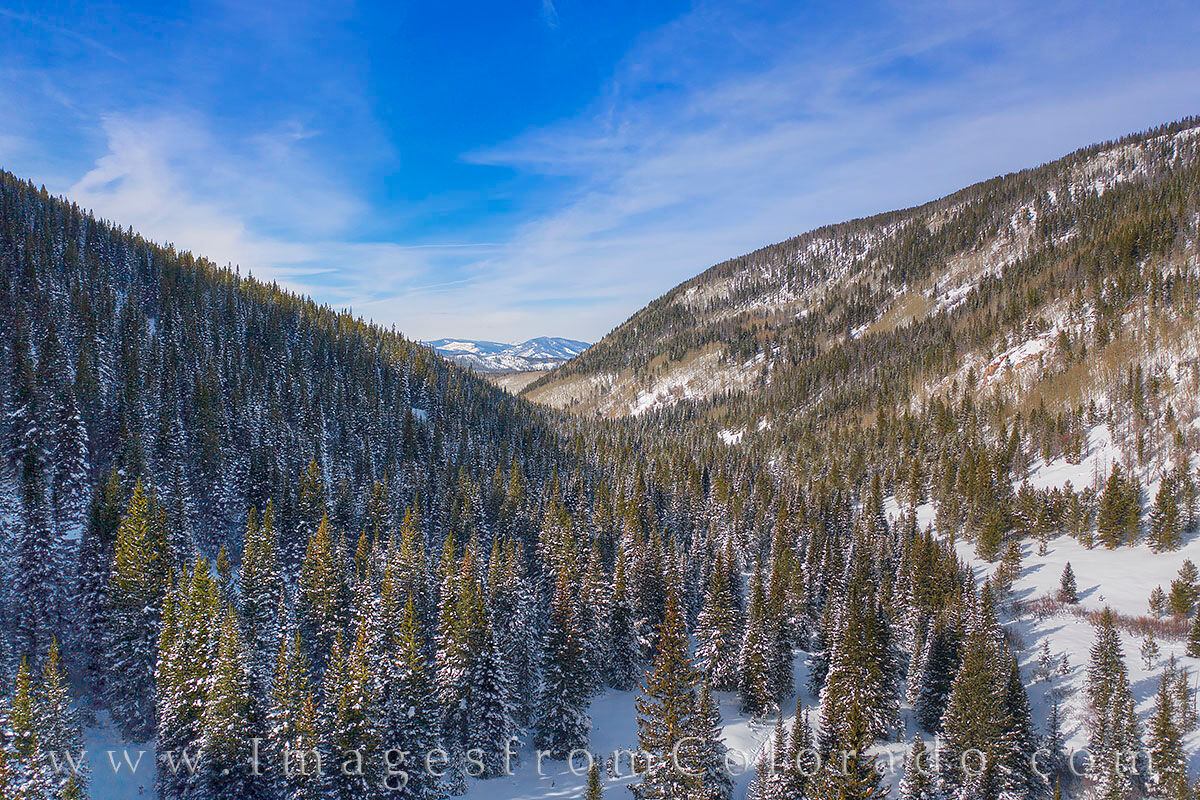 Aerial View Looking towards the Fraser Valley 1228-1 From above the treeline, this view looks north towards Winter Park and the Fraser Valley in Grand County, Colorado. It was a...