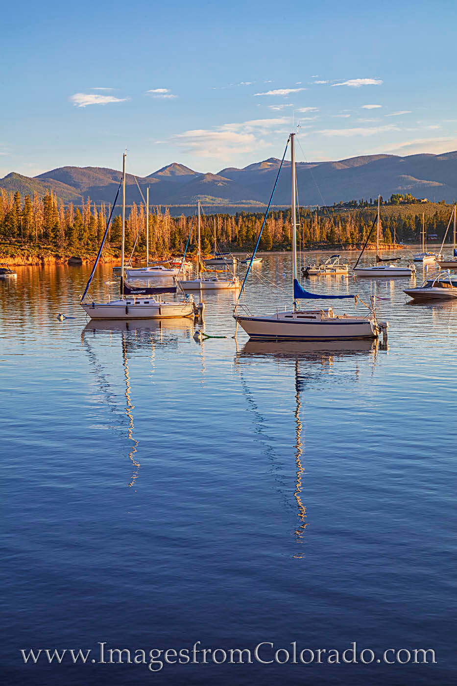 Boats on Lake Granby in the Morning Sunshine 623-1 Sailboats rest quietly in a safe harbor on the waters of Lake Granby. This area is not far from Grand Lake Rocky Mountain National...