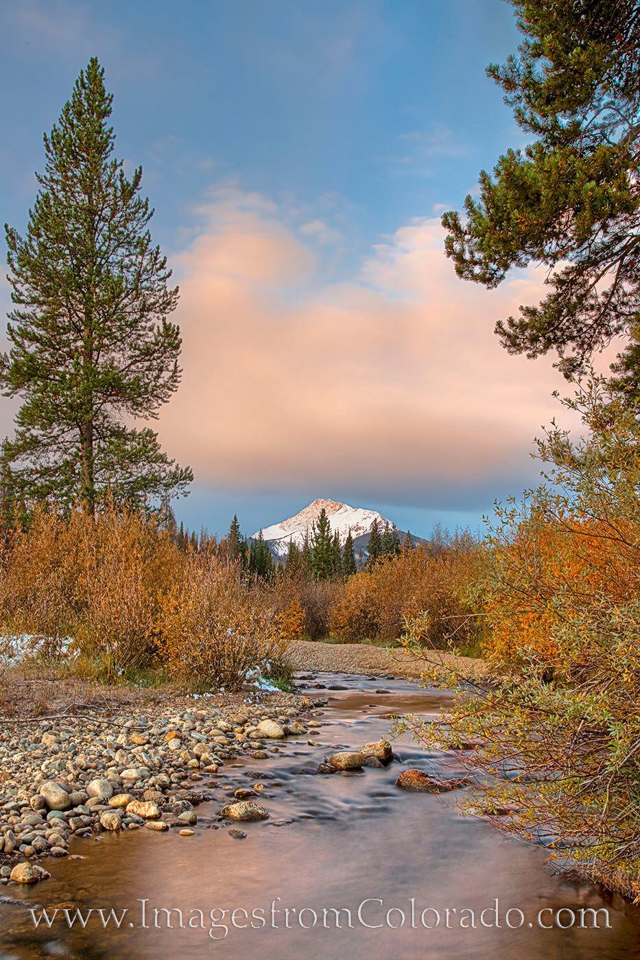 Byers Peak Autumn Morning 1 On a cold day in October, morning clouds drift over over Byers Peak near Fraser, Colorado. The foilage was gold and orange as...