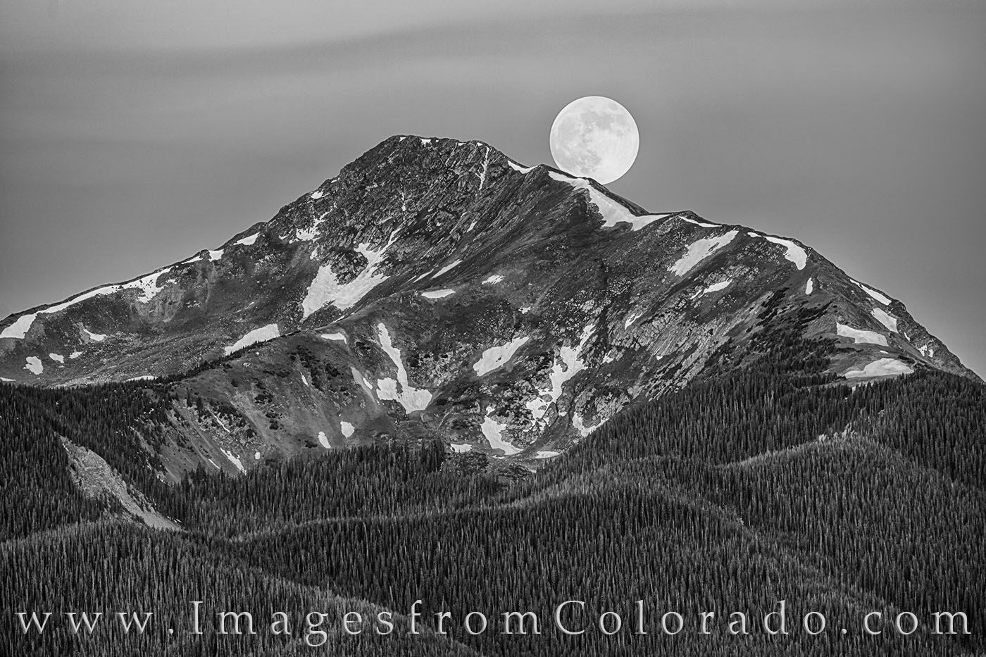 Byers Peak Full Moon Black and White 1 The full moon sets behind Byers Peak in Fraser, Colorado. This black and white photograph shows the iconic landmark of the Fraser...