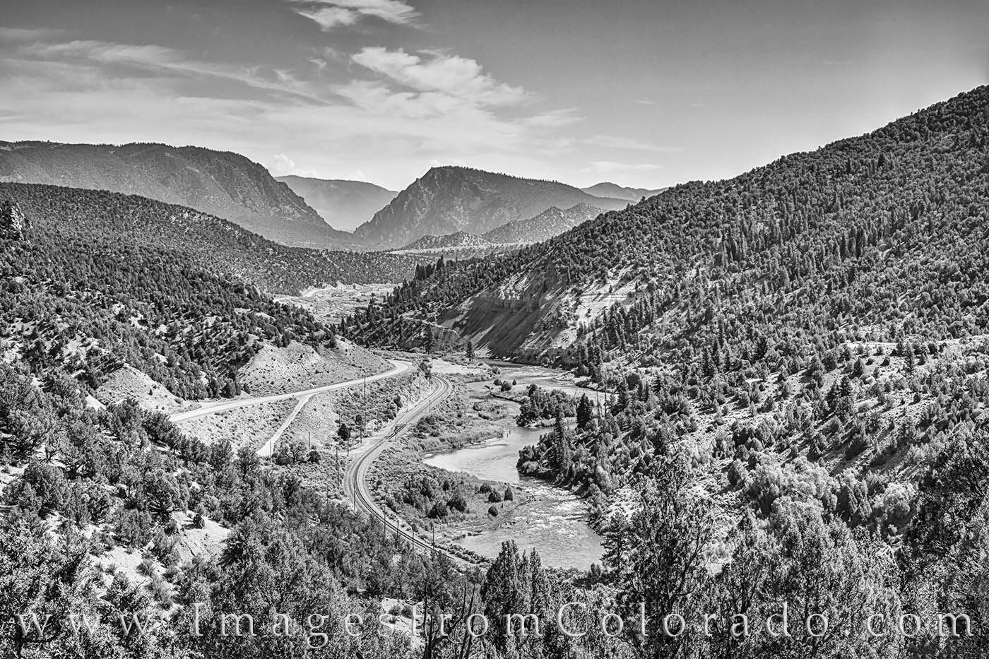 Colorado River from County Road 1 From the edge of Grand County, this black and white photo shows the Colorado River on a warm, summer afternoon. Trough Road is...