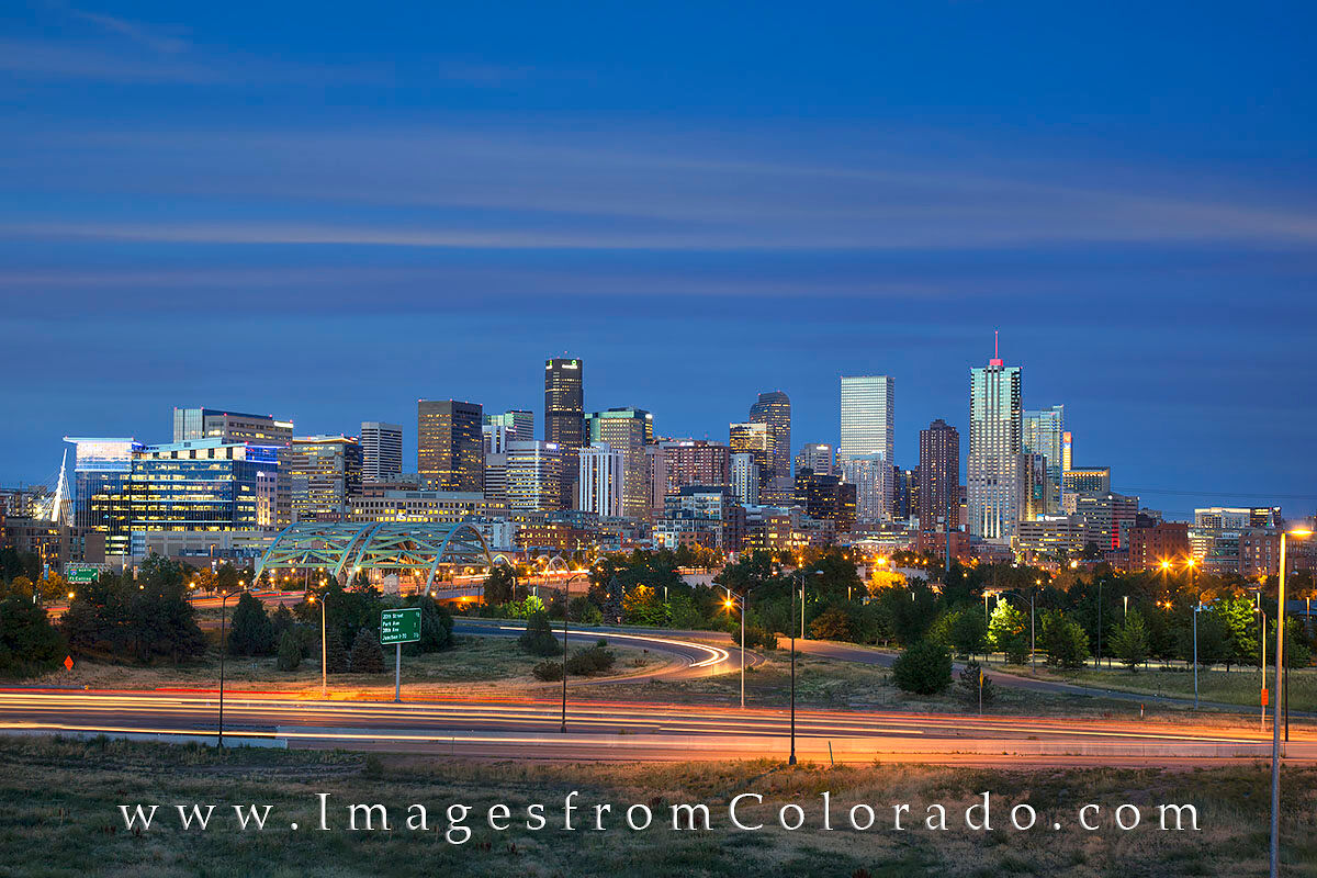 Denver Skyline Evening 2 As the tallest skyscraper in downtown Denver, Republic Plaza rises 728 feet and 56 floors into the nighttime skyline. Just beneath...