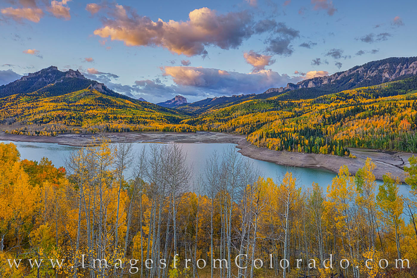 Fall Morning at Silver Jack 104-1 South of Cimarron and on the east end of Owl Pass that runs between Cimarron and Ouray, fall colors fill the slopes around Silver...