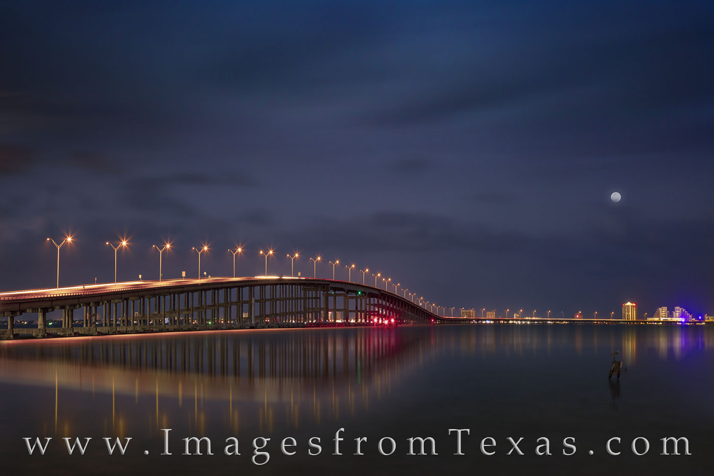 Full Moon Rising over South Padre Island 1 Once a month - and once in a blue moon - the full moon rises in the east as the sun sets in the west. This after-sunset image...