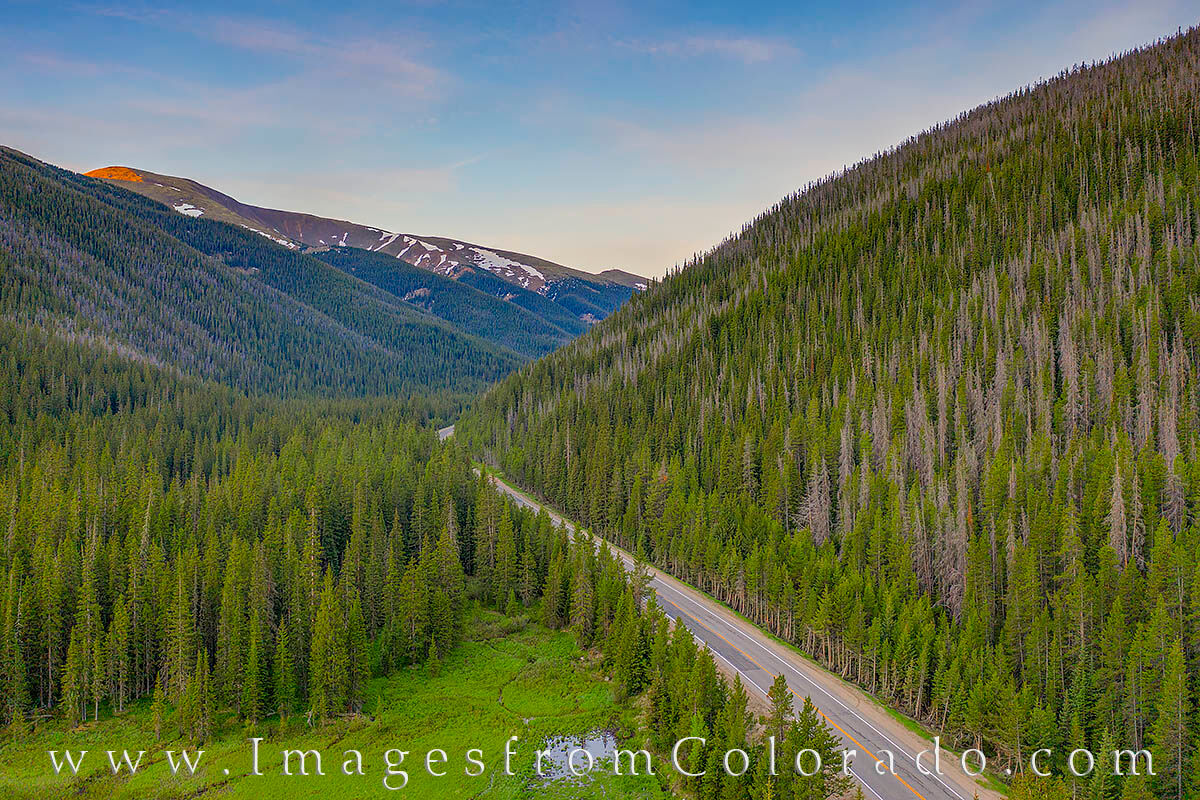Highway 40 Morning on Berthoud Pass 624-1 Highway 40 winds through the mountains of Berthoud Pass between Winter Park and the top of the pass on a summer morning.