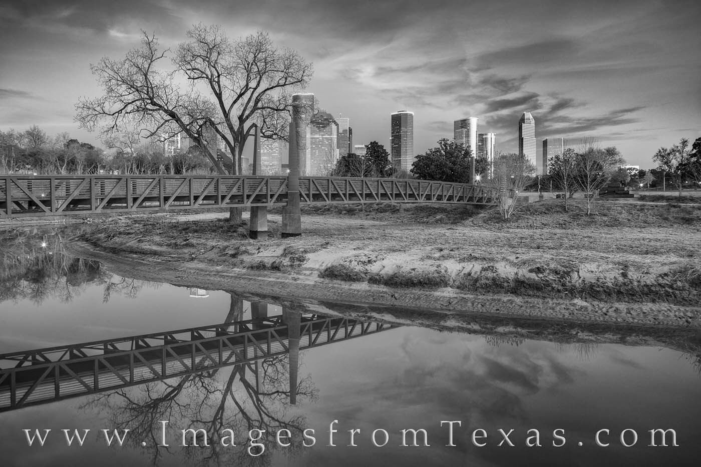 Houston Skyline in Winter black and white 205-1 This black and white photograph from Eleanor Tinsley Park near downtow Houston shows a beautiful and cold night along the shores...