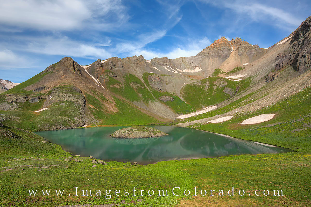 Ice Lakes Trail, Island Lake 1 Island Lake is the reward for making the 4.5 mile hike up the Ice Lakes Trail near Silverton, Colorado. This stunning aquamarine...