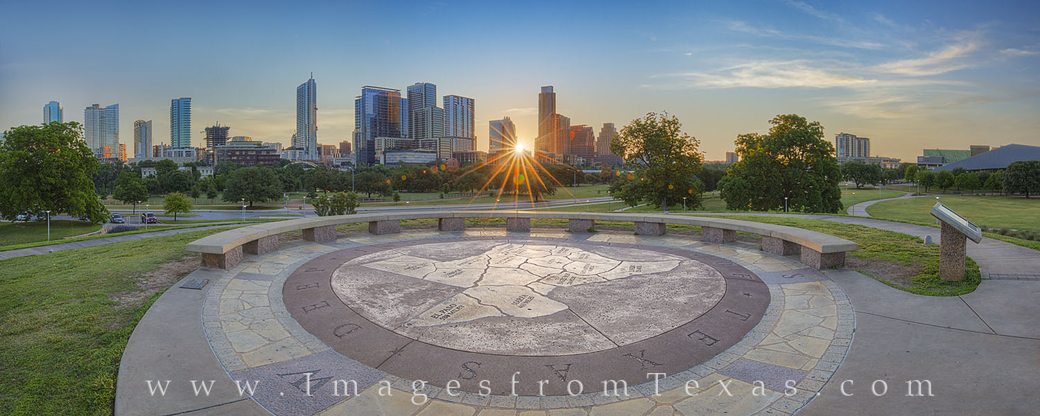 May Sunrise over Austin, Texas, Panorama 1 On a still, quiet May morning, the sun rises over downtown Austin, Texas. The skyline and high rises come to live in this wide...