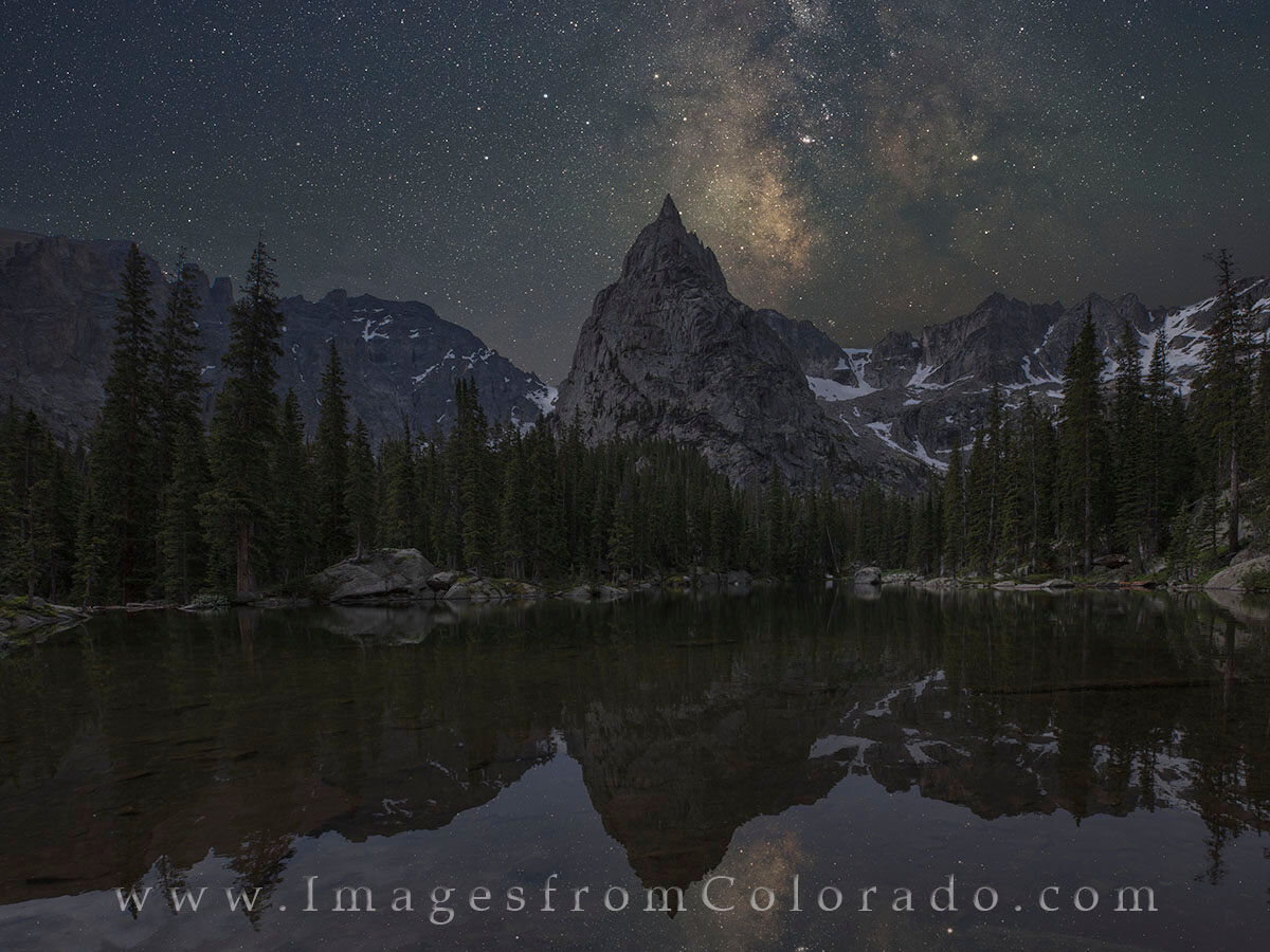 Milky Way over Lone Eagle Peak in June 2 This Lone Eagle Peak image shows the June Milky Way as it looms over the valley and Mirror Lake in the Indian Peaks Wilderness...