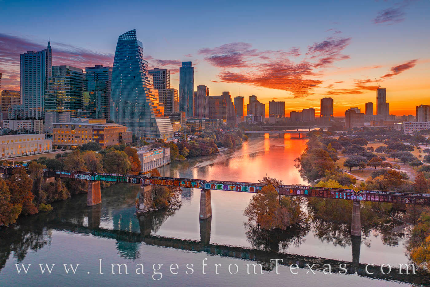 November Sunrise over Downtown Austin 1130-2 From high above the Pfluger Pedestrian Bridge in Downtown Austin, a beautiful Autumn morning begins another day. Ladybird Lake...