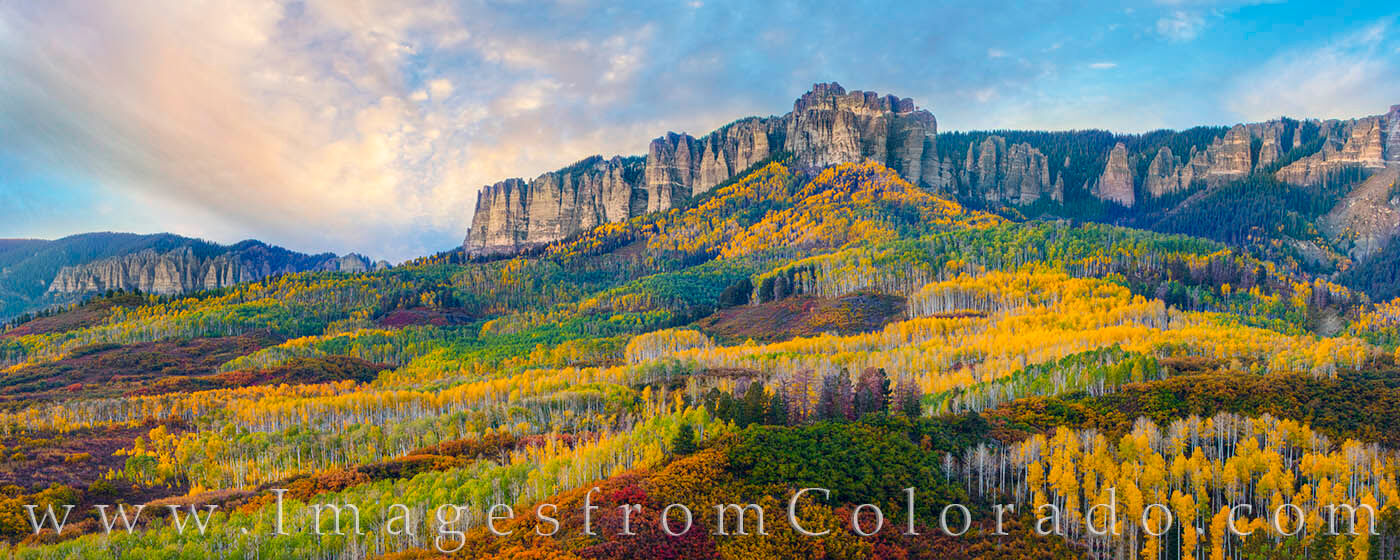 Owl Creek Pass Panorama Autumn Palette 101-1 This amazing display of fall color comes from the dirt road leading up to Owl Creek Pass and the Cimarron Ridge. The greens...