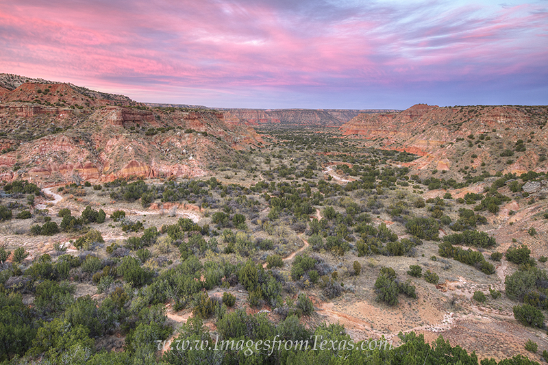 Palo Duro Canyon Sunset 1 The air had a pink hue as the sun set in the west. From the iconic Lighthouse rock formation in Palo Duro Canyon, this view came...