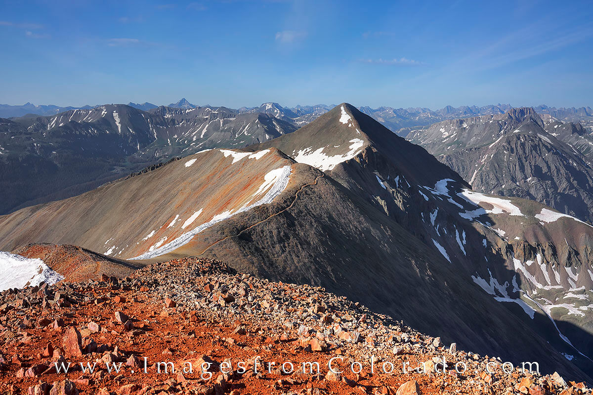 Redcloud and Sunshine Peak 1 From the top of Redcloud Peak at 14,034’, this image looks across the ridge leading to Sunshine Peak at 14,001’. These summits...