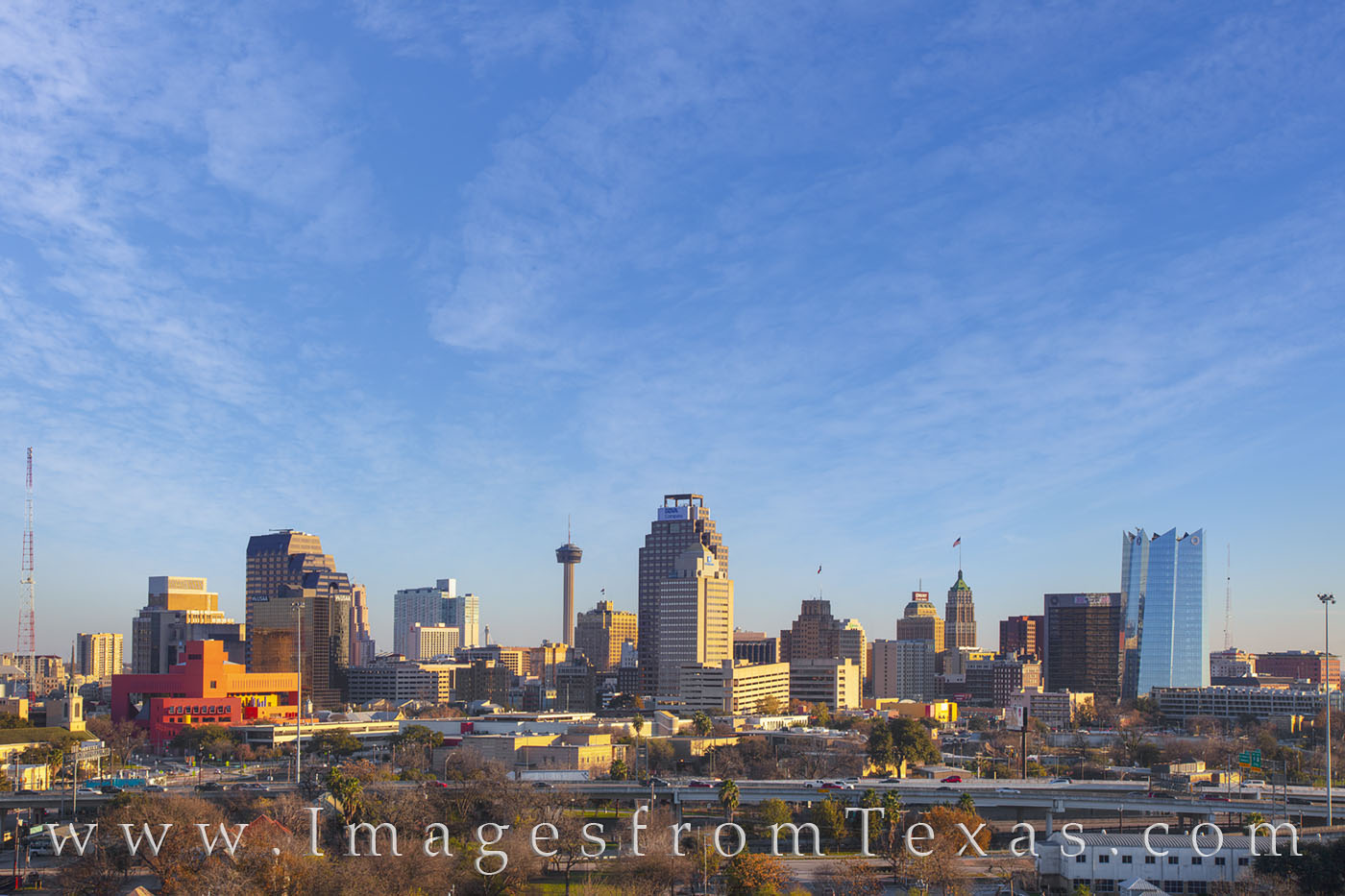 San Antonio Skyline Afternoon 103-2 High clouds drift over the downtown San Antonio skyline on a crisp winter afternoon. The skyline is made distinctive from the...