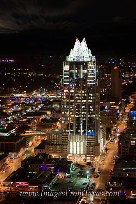 Selfie of the Frost Tower in Austin, Tx As a well known part of the Austin skyline, the Frost Tower has unique architecture and is a beautiful high rise at night.