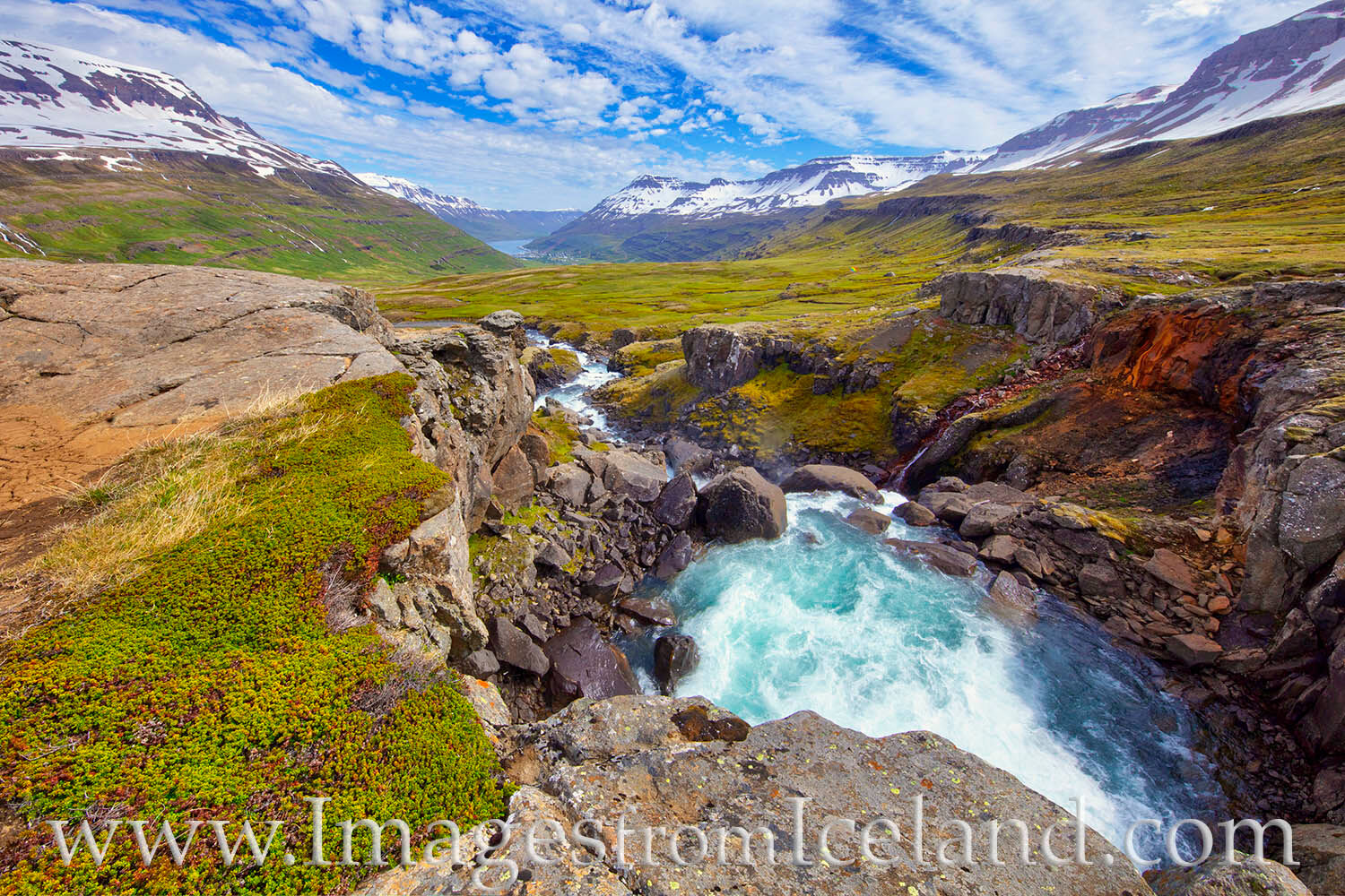 Seydisfjördur from the Fjarðará The Fjarðará is a river that flows down from a mountain pass into the east Iceland town of Seydisfjördur. From this vantage...