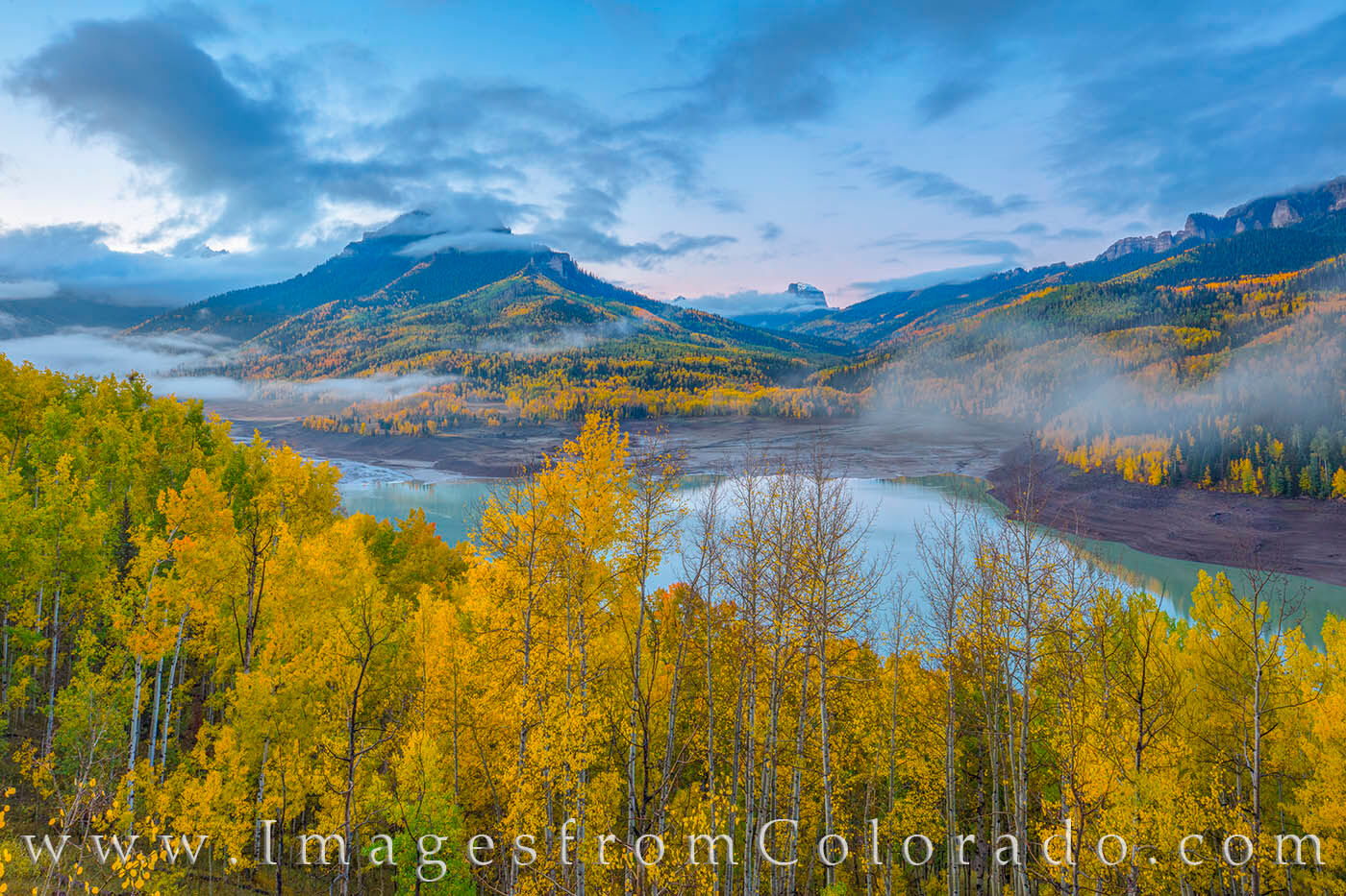 Silver Jack Autumn Morning 102-1 Golden aspen highlight this fall image taken from a ridge above Silver Jack Reservoir. The dirt road makes it easy to access...