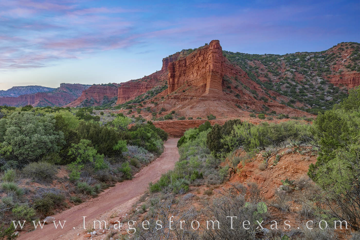 South Prong Trail 108-3 Clouds change from white to pink to darker hues over Caprock Canyons State Park on a cool October evening. This view comes from...