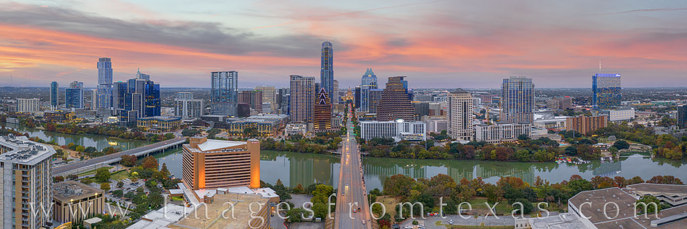 Texas Aerials - Austin Evening over Congress Ave 1 From high above Congress Avenue and Austin, Texas, this aerial photograph looks straight down the main street towards the Texas...