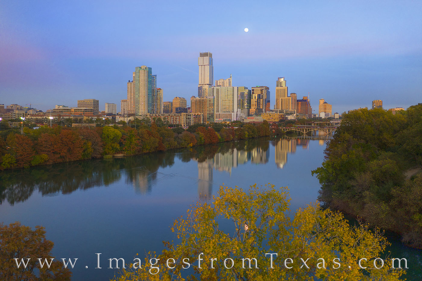 Texas Aerials - Austin Autumn Skyline Full Moon 1120-1 As a full moon rises over the Austin skyline on a cool November evening, the trees along Town Lake (formally known as Ladybird...