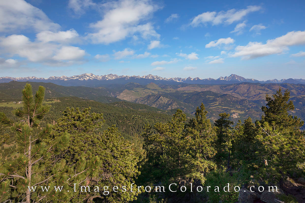 View of RMNP from the Flat Irons From the Flat Irons, this Colorado landscape looks across the valley towards Rocky Mountain National Park. On the right side...