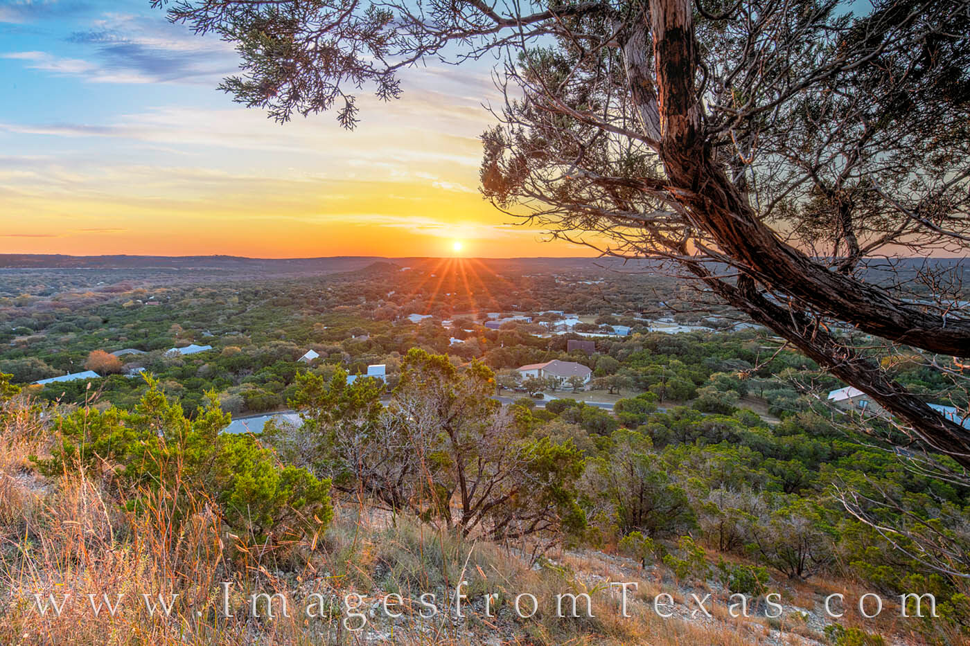 Wimberley Sunrise from Old Baldy 1 Atop Old Baldy in Wimberley Texas, the views stretch for miles and miles. Here, an Autumn sunrise is seen through the branches...