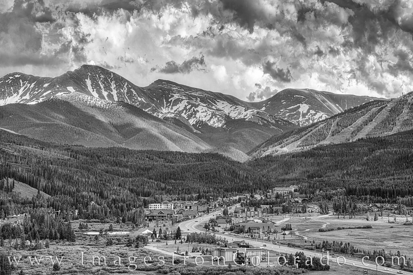 Winter Park and Parry Peak Black and White 701-1 Late afternoon storm clouds roll across Parry Peak and Berthoud Pass as the resort town of Winter Park sits in their shadows....